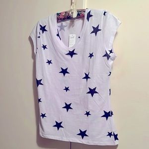 Casual white top with blue stars.
